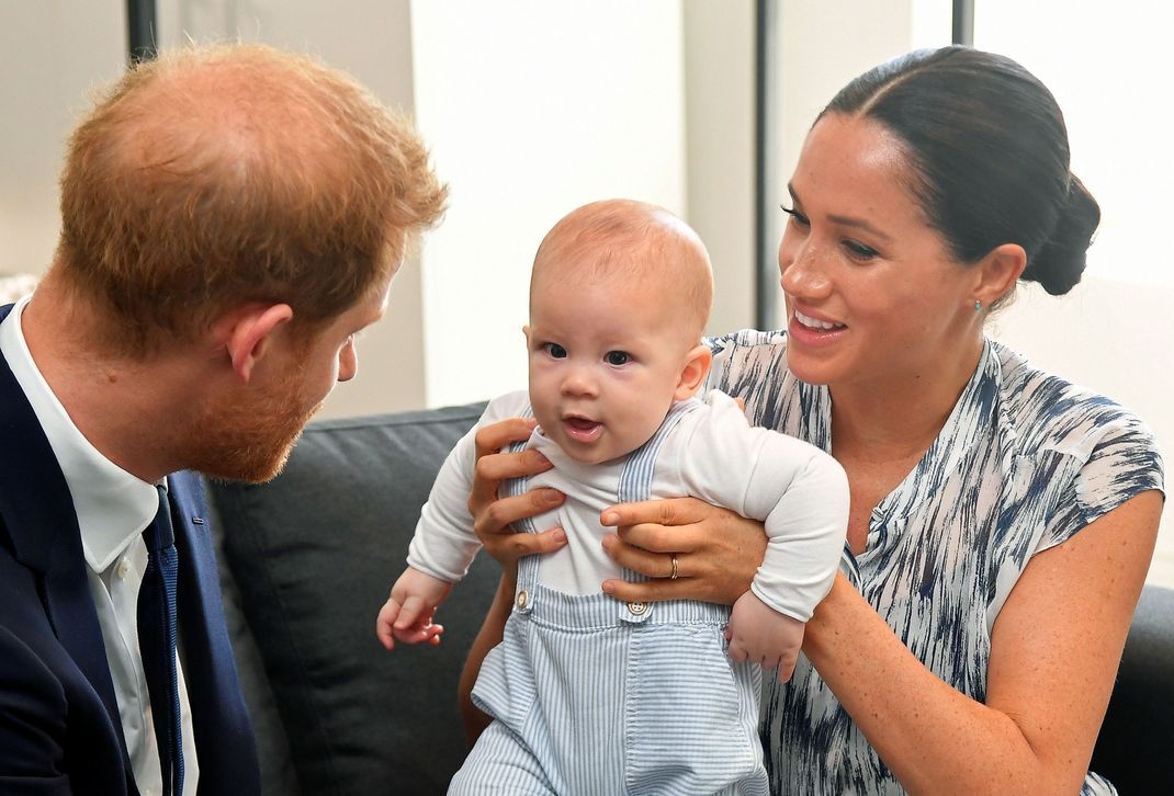 The Duke and Duchess of Sussex holding their son Archie during a meeting with Archbishop Desmond Tutu.