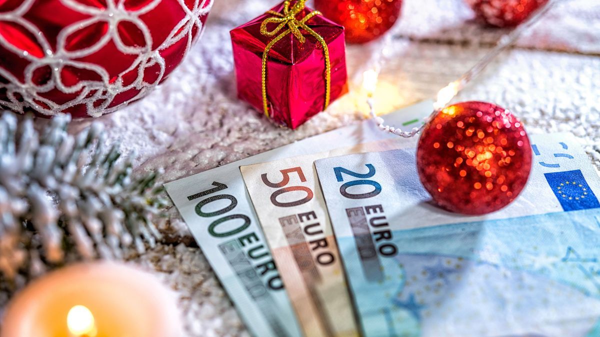 christmas ball with euro banknotes