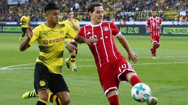 
                <strong>Mahmoud Dahoud (Borussia Dortmund)</strong><br>
                Mahmoud Dahoud: Der Neuzugang von Borussia Mönchengladbach ist in der ersten Halbzeit der laufstärkste BVB-Spieler. Wenn auch manchmal ineffektiv, zeigt Dahoud eine wahnsinnige Präsenz auf dem Platz. Muss im Abschluss noch an der Präzision arbeiten, doch Dahoud ist maßgeblich daran beteiligt, dass der BVB die Anfangsphase dominiert. ran-Note: 2
              