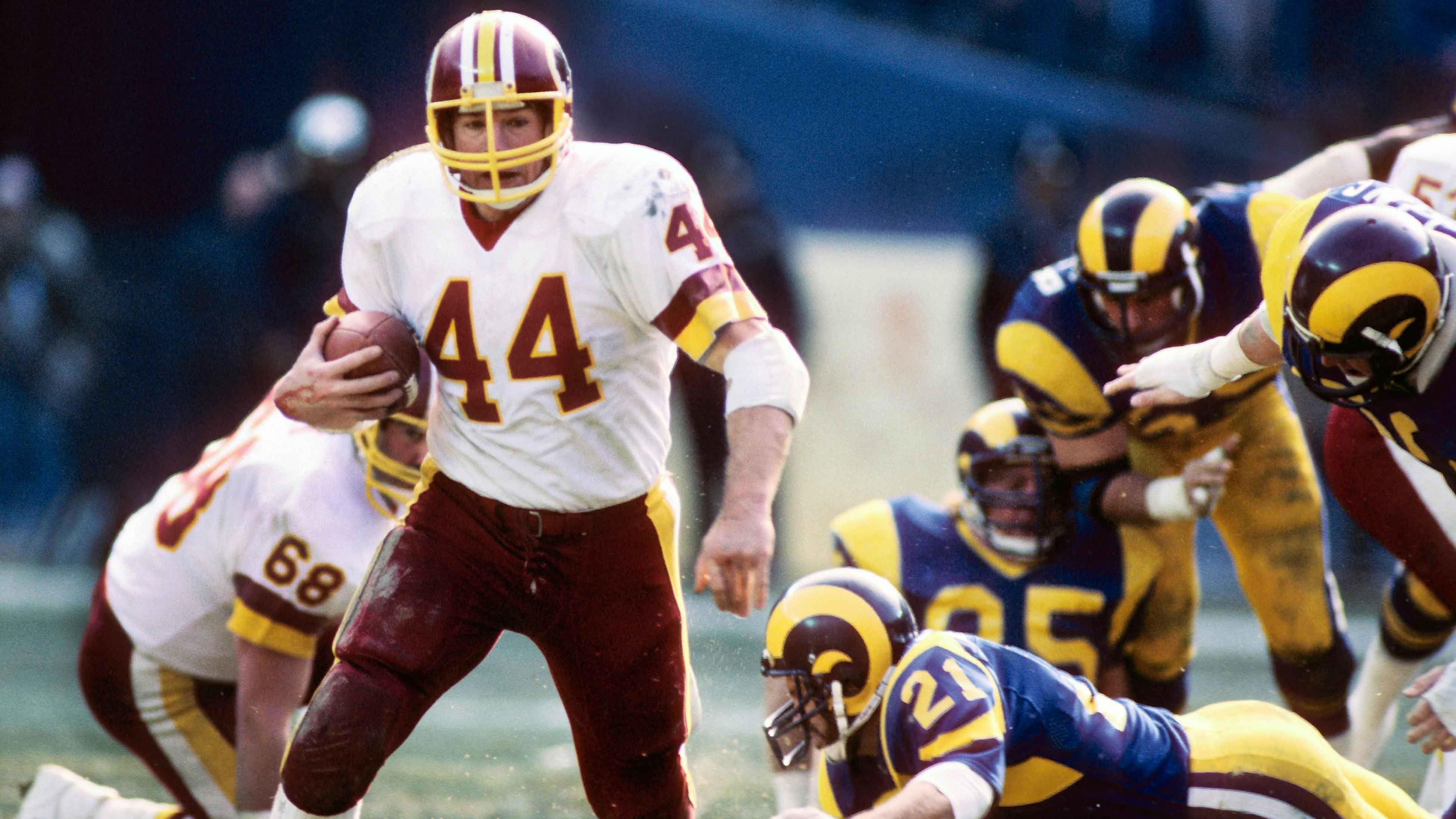 
                <strong>Washington Commanders: John Riggins</strong><br>
                7.472 Yards bei 1.988 Runs - 79 Touchdowns
              