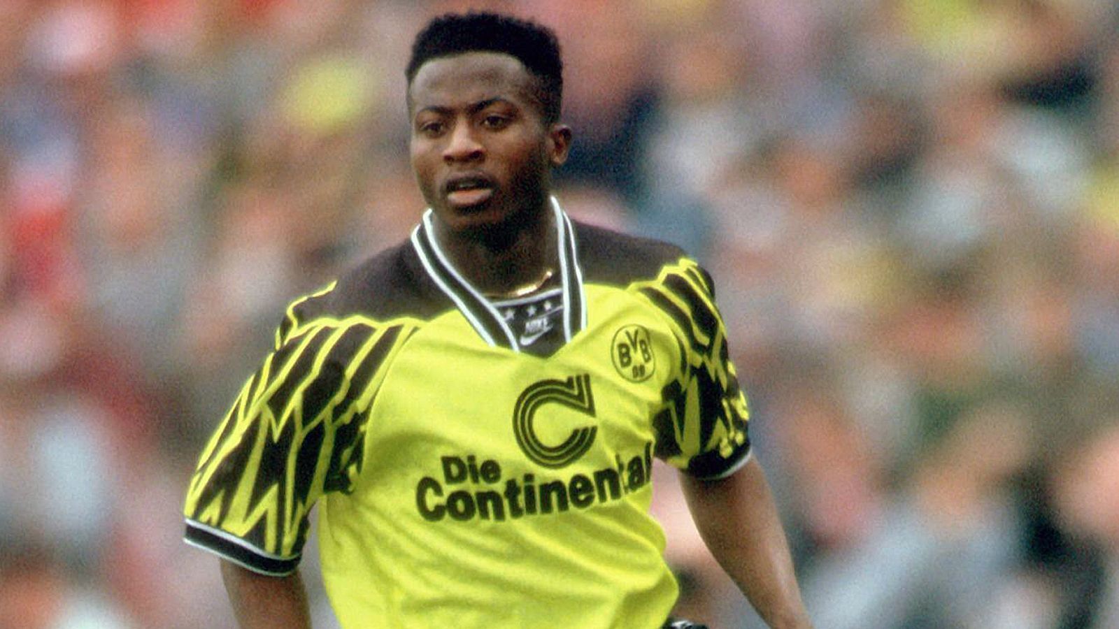 
                <strong>Platz 6 - Ibrahim Tanko (Borussia Dortmund)</strong><br>
                Alter beim Debüt: 17 Jahre, ein Monat, 30 Tage - Begegnung: Borussia Dortmund - VfB Stuttgart 5:0 (24. September 1994)
              