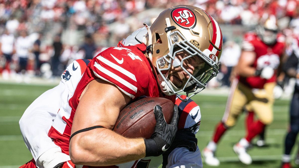 San Francisco 49ers fullback Kyle Juszczyk (44) is tackled by New England Patriots linebacker Joshua Uche after taking a pass from QB Brock Purdy in the second quarter at Levi s Stadium on Sunday, ...