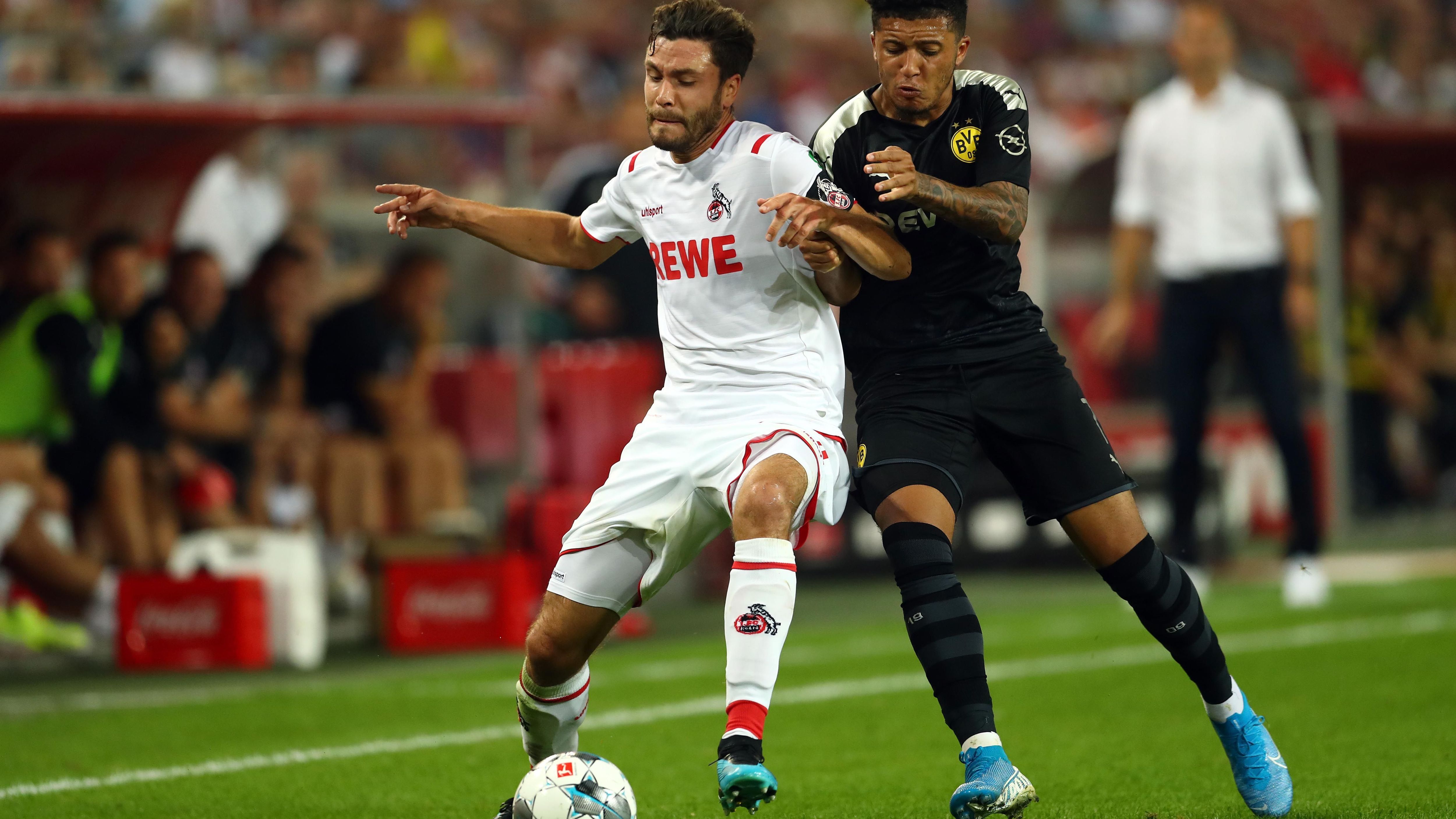 
                <strong>Jadon Sancho</strong><br>
                Packt von Beginn an wieder seine cleveren Pässe in die Tiefe aus. Wird danach aber vom FC aus dem Spiel genommen und bleibt erst einmal blass. In der 68. Minute zeigt er sich wieder mit einem Schuss aufs Tor. Nach der folgenden Ecke ist er dann erfolgreich, macht das wichtige 1:1 für den BVB und stellt wieder einmal unter Beweis, dass er zu jeder Zeit das Spiel drehen kann. In der Nachspielzeit startet er einen überragenden Konter und legt clever zum 3:1 für Kollege Alcacer auf. ran-Note: 2
              