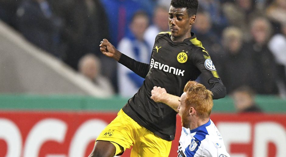 
                <strong>Alexander Isak</strong><br>
                Isak vergibt in der Anfangsphase aus sieben Metern und ist danach eine knappe halbe Stunde unsichtbar, doch in der 41. Minute bereitet er die BVB-Führung per Kopf und mit viel Übersicht vor. Gute Aktion! Und dann trifft er kurz nach Wiederanpfiff auch noch eiskalt zum 2:0. Der Schwede beißt sich ins Spiel, legt die Bälle immer wieder klug auf nachrückende Mitspieler ab. In Magdeburg ist er ein starker Vertreter des verletzten Aubameyang und belohnt sich mit seinem ersten Pflichtspieltor für Dortmund. ran-Note: 1
              