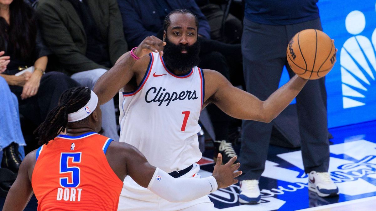 November 2, 2024, Inglewood, California, USA: James Harden 1 of the Los Angeles Clippers passes the ball as Luguentz Dort 5 of the Oklahoma City Thunder attempts a steal during their regular season...