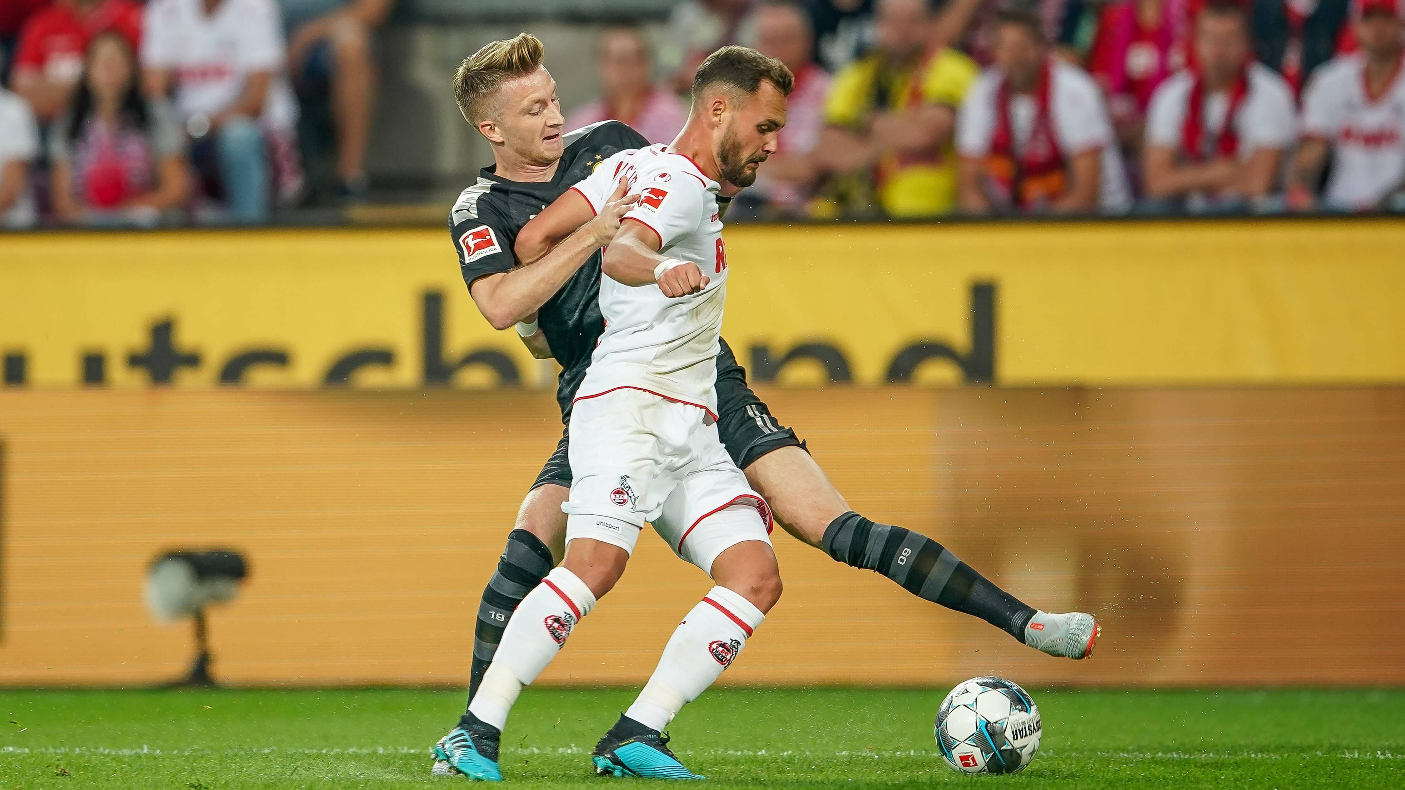 
                <strong>Marco Reus</strong><br>
                Der Kapitän marschiert und ist überall unterwegs. Schnappt sich in der 23. Minute den Ball, schießt aus einer vielversprechenden Freistoßposition und sorgt damit für die erste größere BVB-Chance – scheitert aber an Horn. Wenn offensiv etwas für Dortmund geht, hat meistens Reus irgendwie seinen Fuß mit drin. Profitiert auch von der Einwechslung von Brandt, der seinen Teamkollegen immer wieder in der Offensive sucht. ran-Note: 2
              