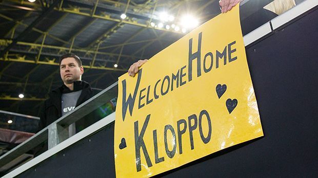 
                <strong>Welcome Home Kloppo</strong><br>
                "Welcome Home Kloppo!" Begeisterte Willkommensplakate auch im Signal-Iduna-Park. Überall wird der Liverpool-Trainer herzlich empfangen.
              