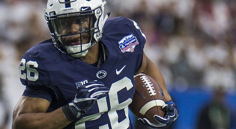 
                <strong>5. Pick - Denver Broncos: RB Saquon Barkley</strong><br>
                Wenn die Browns nicht wollen, schlagen eben die Denver Broncos zu und holen sich Saquon Barkley. Zwar hatte General Manager John Elway angekündigt, dass der fünfte Pick zum Verkauf stehe, da aber Barkley noch zu haben ist, verzichten die Broncos auf einen Trade und holen stattdessen die nach dem Abgang von C.J. Anderson dringend benötigte Verstärkung für das Laufspiel. Barkley hat die Klasse, das Backfield der Broncos auf ein anderes Level zu heben. Eigentlich war vermutet worden, dass auch die Broncos einen neuen Quarterback für die Zukunft holen, aber John Elway stellte gerade erst klar, dass er weiter an die Entwicklung von Paxton Lynch glaubt. Und in der nächsten Saison wird ohnehin Case Keenum die Bälle durch die dünne Luft der Mile-High-City werfen.  
              