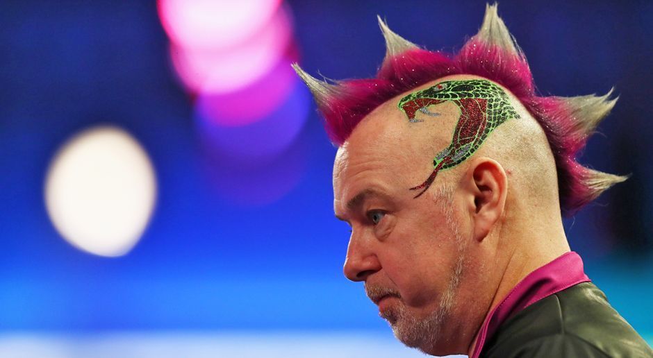 
                <strong>Bester Schnitt: Peter Wright </strong><br>
                Peter Wright rasiert nicht nur am Darts-Board! Gut, dass seine Frau Frisörin ist und dem Schotten immer wieder seine ausgefallenen Looks kreiert. Style-Check bestanden! Herzlichen Glückwunsch zum ran-Oscar! 
              