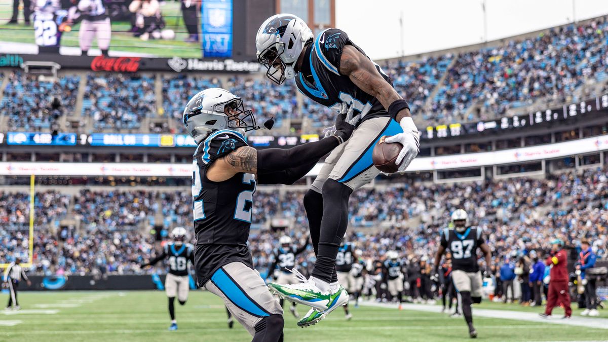 November 30, 2025, Charlotte, North Carolina, U.S: November 30, 2025, Charlotte, North Carolina, USA: Carolina Panthers safety Nick Scott (21) make an interception during the first half of the game...