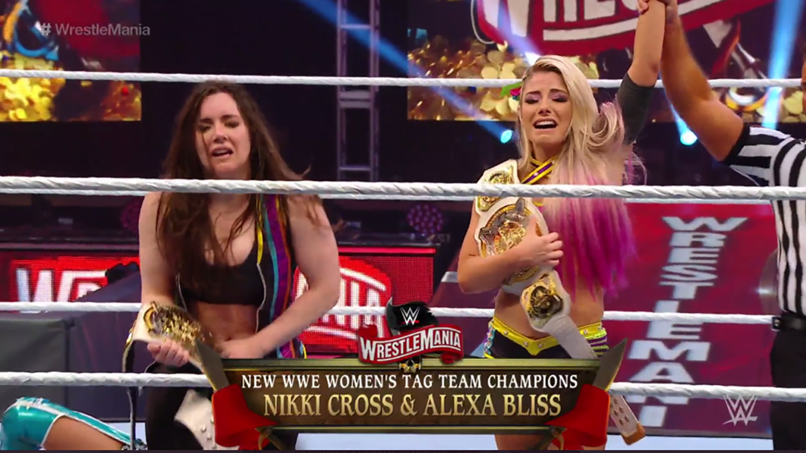 
                <strong>WWE Women's Tag Team Championship: The Kabuki Warriors (Asuka und Kairi Sane) (c) vs. Alexa Bliss und Nikki Cross</strong><br>
                Das war laut. So ganz ohne Publikum nimmt man die verbal starken Asuka und Kairi Sane noch einmal ganz anders wahr. Und Nikki Cross steht ihnen in Nichts nach. Am Ende macht dann ausgerechnet die Ruhigste den Unterschied. Twisted Bliss gegen Kairi Sane und Alexa Bliss krönt sich und Nikki Cross zu den neuen Champions.
              