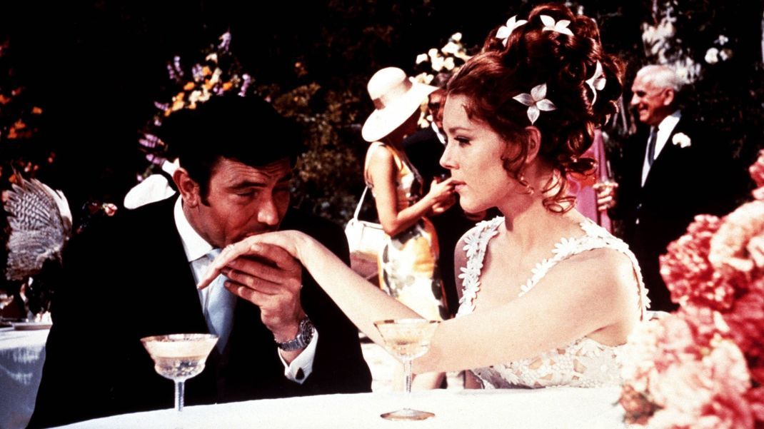 George Lazenby und Diana Rigg im "James Bond"-Film "Im Geheimdienst Ihrer Majestät" (1969).