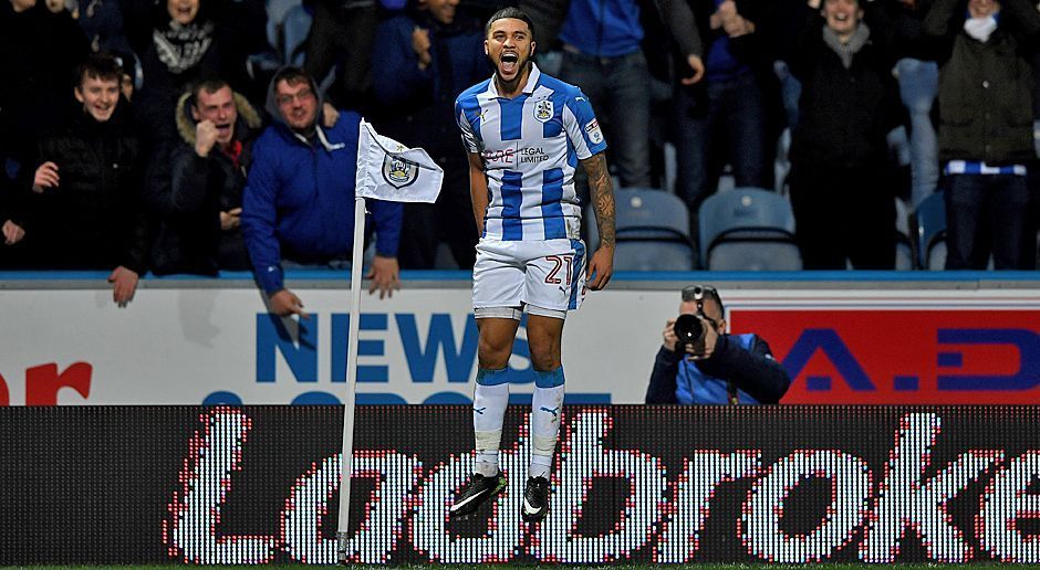 
                <strong>Sturm: Nahki Wells - der Exot</strong><br>
                Der 26-jährige Mittelstürmer ist mit seiner Körpergröße von 1,70m sehr agil und schwer zu fassen für meist eher hölzerne, englische Verteidiger. Mit 17 Jahren debütierte er bereits für sein Heimatland: Bermuda! Dort ist er seit Jahren ein gefeierter Spieler. Für Huddersfield Town schoss er nach Kachunga die meisten Tore: zehn. Mit 13 Auswechslungen und 14 Einwechslungen war er eine Variable im Wagner-System. Meist teilte er sich den Platz im Sturm mit dem ehemaligen Stürmer von Union Berlin, Collin Quaner.
              