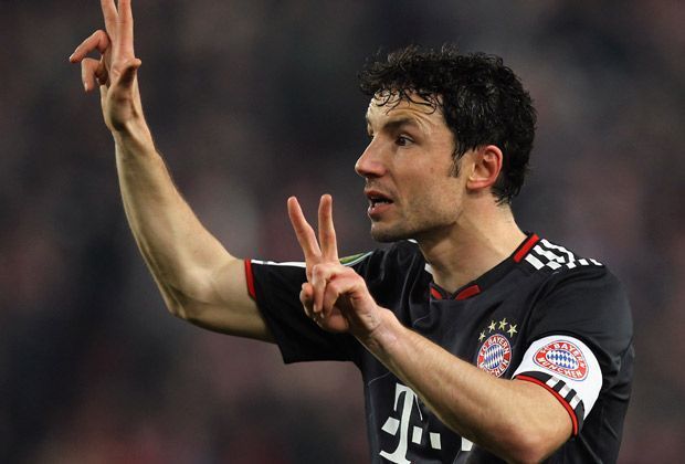 
                <strong>Mark van Bommel</strong><br>
                Bei den Bayern wird van Bommel zu einer prägenden Figur. In fünf Jahren holt der Niederländer zwei Mal das Double und führt die Mannschaft ins Champions-League-Finale 2010. 2011 wechselt van Bommel zum AC Mailand.
              