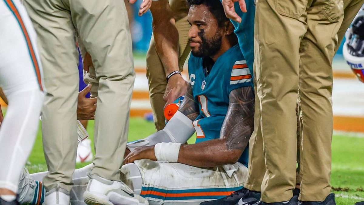 September 17, 2024: Miami Dolphins quarterback Tua Tagovailoa (1) sits on the field as he is attended to after an injury during the game against the Buffalo Bills in the second half at Hard Rock St...