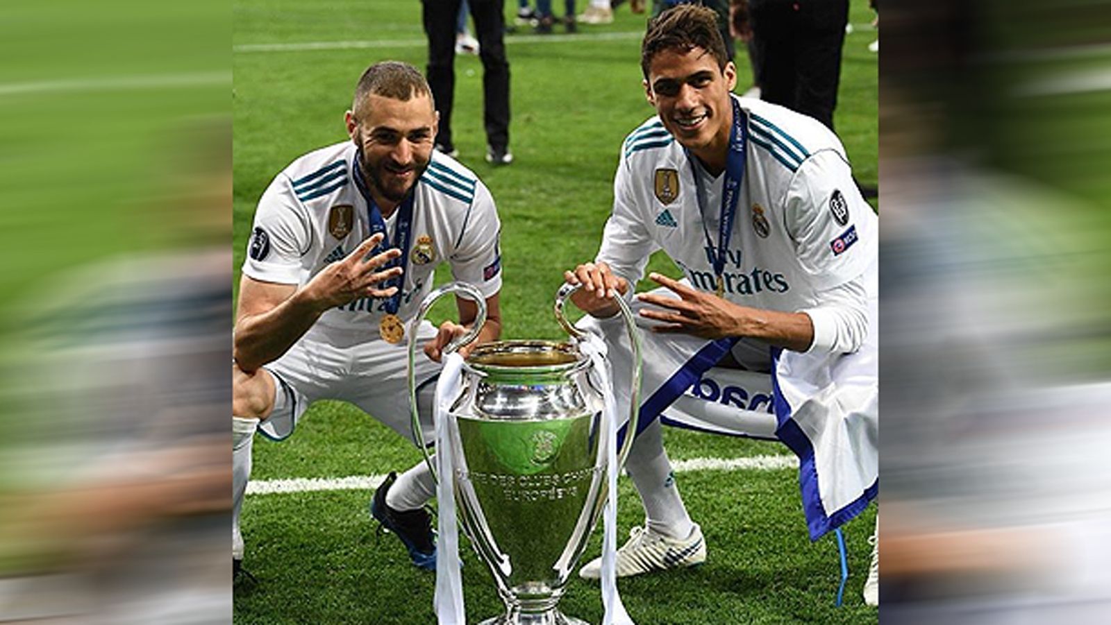 
                <strong>Karim Benzema (li.) und Raphael Varane (re.)</strong><br>
                Die französische Connection um Karim Benzema (li.) und Raphael Varane feiert den 13. Champions-League-Triumph in der Vereinsgeschichte von Real Madrid.
              
