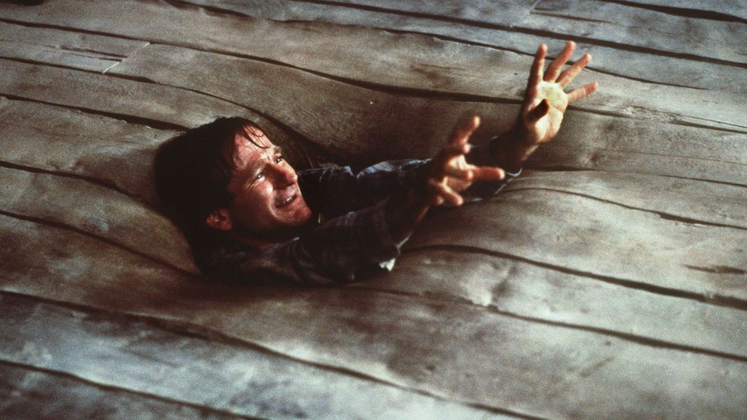 US-Schauspieler Robin Williams als Alan Parrish, der im Film "Jumanji" (1995) für 26 Jahre in einer unbekannten Welt verschwand, bis ihn seine Kinder befreiten.