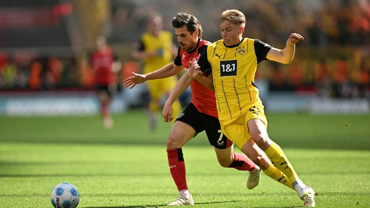 Daniel Svensson (r.) bleibt beim BVB