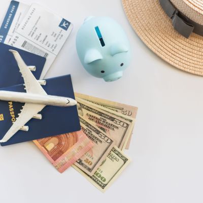 Travel or vacation money saving concept, piggy bank