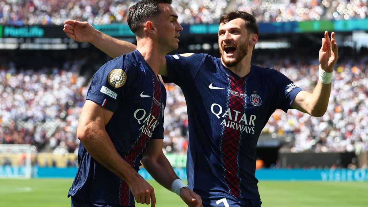 Fabian Ruiz (L) of Paris Saint-Germain celebrates with team-mate Khvicha Kvaratskhelia after scoring his team s first goal during the 2025 FIFA Club World Cup Semi Final match at MetLife Stadium in...