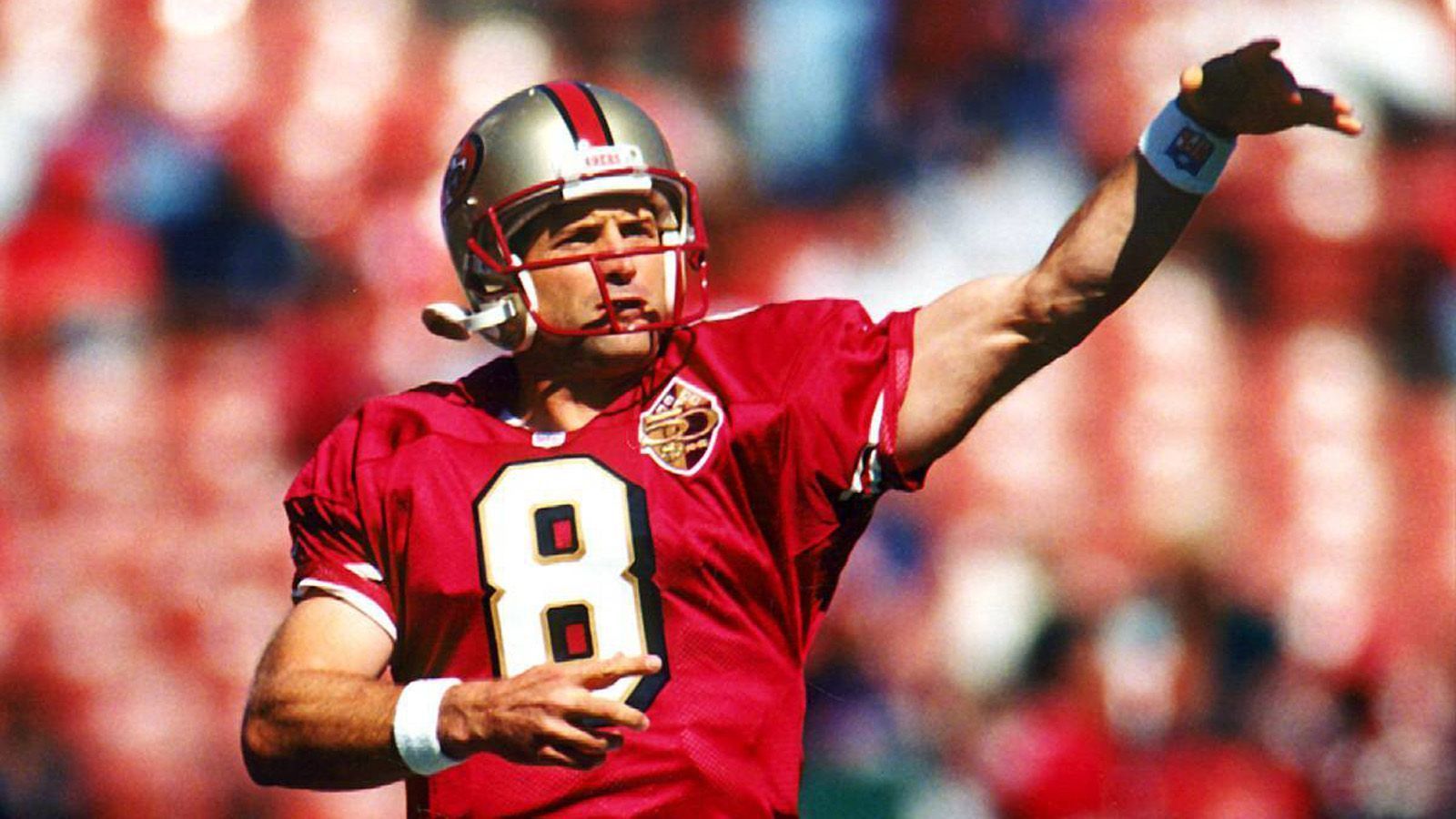 <strong>San Francisco 49ers</strong><br>
                8:&nbsp;Steve Young (im Bild)<br>12:&nbsp;John Brodie<br>16:&nbsp;Joe Montana<br>34:&nbsp;Joe Perry<br>37:&nbsp;Jimmy Johnson<br>39:&nbsp;Hugh McElhenny<br>42:&nbsp;Ronnie Lott<br>70:&nbsp;Charlie Krueger<br>73:&nbsp;Leo Nomellini<br>79:&nbsp;Bob St. Clair<br>80:&nbsp;Jerry Rice<br>87:&nbsp;Dwight Clark

