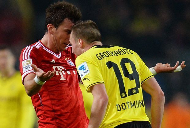 
                <strong>Mario Mandzukic vs. Kevin Großkreutz</strong><br>
                Freunde werden diese zwei Herren wohl nicht mehr: Bayerns Mario Mandzukic (l.) und Dortmunds Kevin Großkreutz (r.) liefern sich im Top-Spiel der Bundesliga ein hitziges Duell - auch ohne Ball.
              