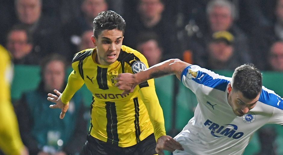 
                <strong>Marc Bartra</strong><br>
                Marc Bartra: Unterläuft in der Anfangsphase eine Freistoßflanke der Sportfreunde, die fast zum 1:0 geführt hätte. Danach zögerlich gegen Freiberger, der mit einem Lupfer aus 16 Metern fast Bürki überwunden hätte. Dann mit einem gefährlichen Fehler im Spielaufbau. Es ist nun wirklich nicht Bartras beste erste Halbzeit im BVB-Trikot. Auch nach der Pause sorgt er für eine Schrecksekunde bei den BVB-Fans, als er an der eigenen Grundlinie leichtsinnig den Ball gegen Freiberger verliert. Macht den Fehler aber gleich mit einer starken Balleroberung wieder gut. ran-Note: 3,5
              