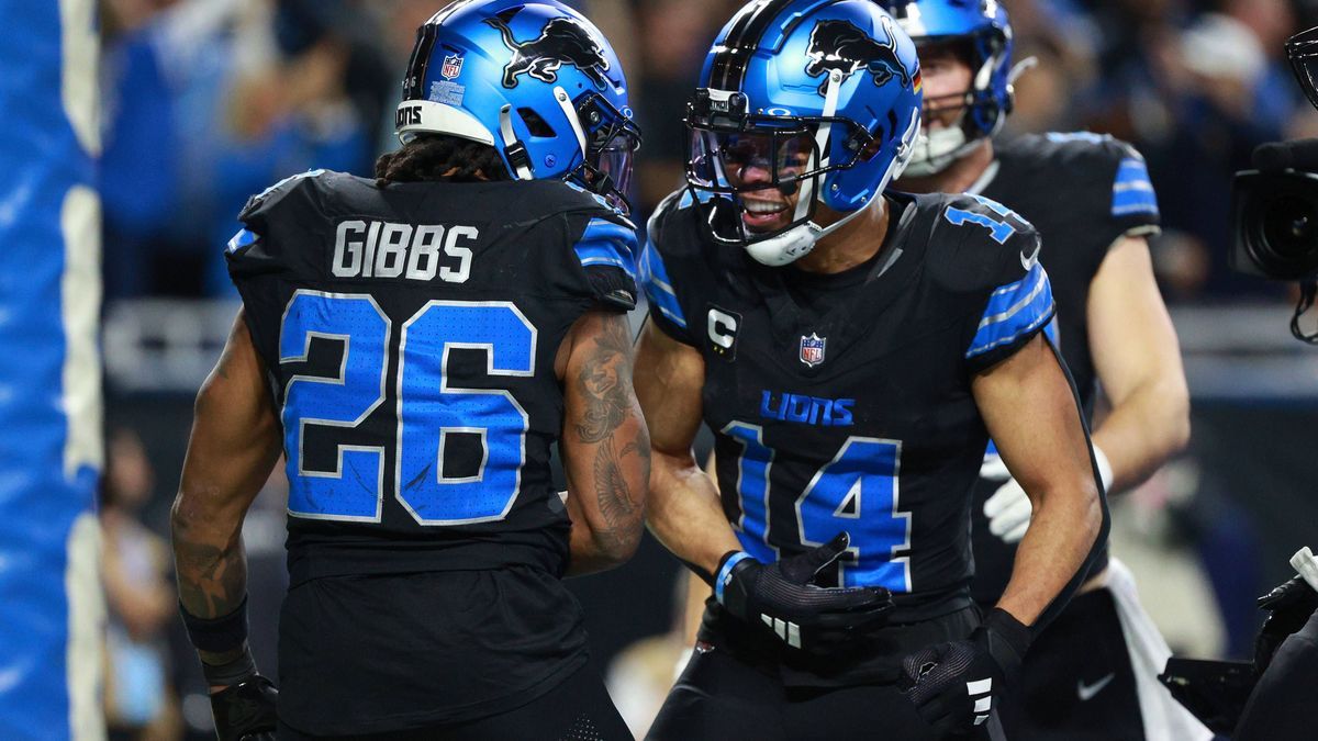 Minnesota Vikings vs Detroit Lions DETROIT,MICHIGAN-January 5: Detroit Lions running back Jahmyr Gibbs 26 celebrates with teammate wide receiver Amon-Ra St. Brown 14 after his touchdown during the ...