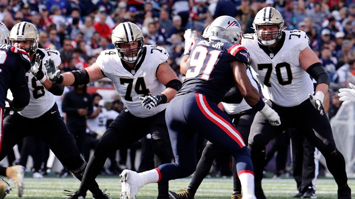 FOXBOROUGH, MA - OCTOBER 08: New Orleans Saints offensive Guard James Hurst (74) and New Orleans Saints offensive tackle Trevor Penning (70) hold the line during a game between the New England Patr...
