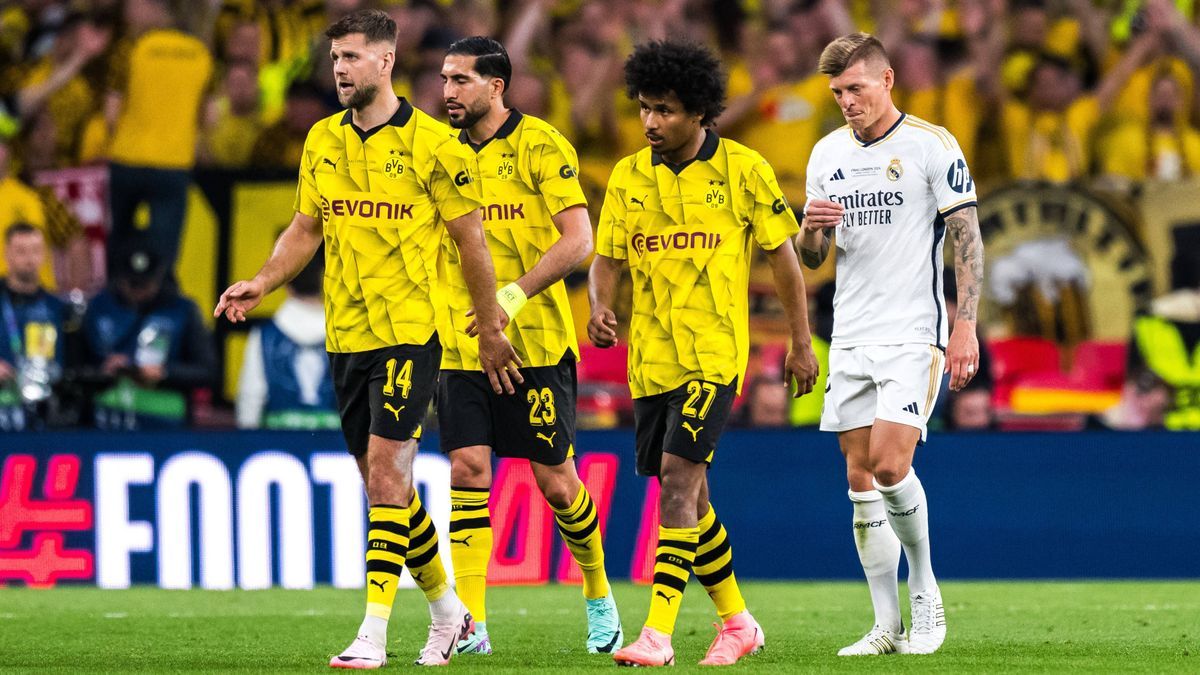 240601 Toni Kroos of Real Madrid and Niclas Fullkrug, Emre Can, and Karim Adeyemi of Dortmund looks dejected during the UEFA Champions League final between Dortmund and Real Madrid on June 1, 2024 ...