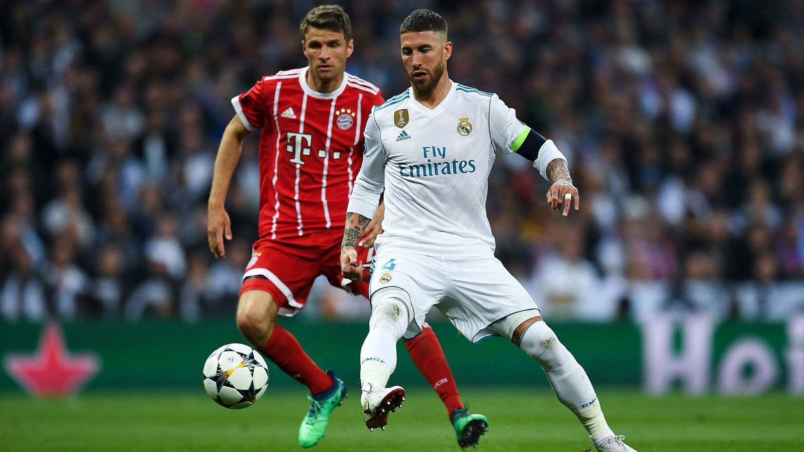 
                <strong>FC Bayern München</strong><br>
                David Alaba kehrt dem FCB den Rücken und läuft künftig für Real Madrid auf - geht Sergio Ramos möglicherweise den umgekehrten Weg? Im Januar wurde in der Talkshow "El Chiringuito"" darüber gesprochen, dass sich der deutsche Serienmeister bei seinen spanischen Spielern Javi Martinez und Marc Roca nach dem Innenverteidiger erkundigt haben soll. Allerdings ist aufgrund des hohen Gehalts das Gerücht um ein Engagement in der bayrischen Landeshauptstadt eher mit Vorsicht zu genießen.
              