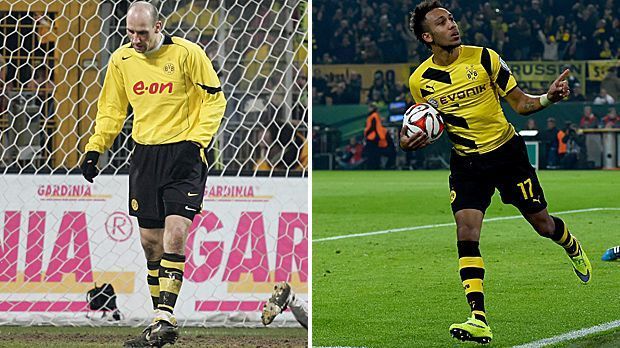 
                <strong>Jan Koller vs. Pierre-Emerick Aubameyang</strong><br>
                Stürmer: Jan Koller vs. Pierre-Emerick Aubameyang - Zwei komplett unterschiedliche Stürmertypen mit einer Gemeinsamkeit: Sie waren beide die Top-Torjäger des BVB. Koller erzielte 15 Tore und gab drei Vorlagen, Aubameyang machte sogar 16 Tore bei sieben Vorlagen. Der Punkt geht an deshalb den pfeilschnellen Gabuner. 2005 6:6 2015.
              