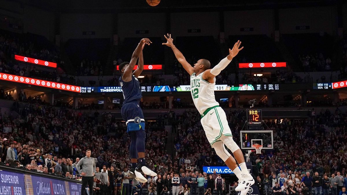 NBA, Basketball Herren, USA Boston Celtics at Minnesota Timberwolves Mar 15, 2023; Minneapolis, Minnesota, USA; Minnesota Timberwolves guard Anthony Edwards (1) takes a three-pointer as Boston Celt...