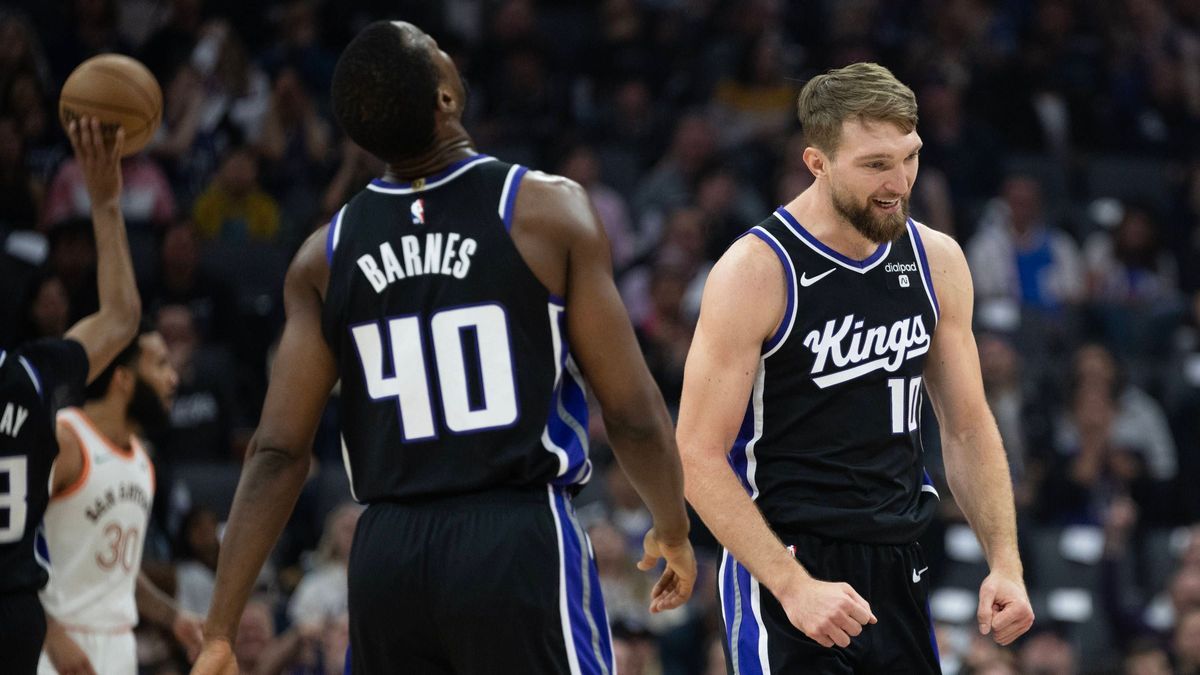 March 7, 2024, Sacramento, Ca, USA: Sacramento Kings Domantas Sabonis and Harrison Barnes reacts after scoring during a game against the San Antonio Spurs at Golden 1 Center on Thursday, March 7, 2...
