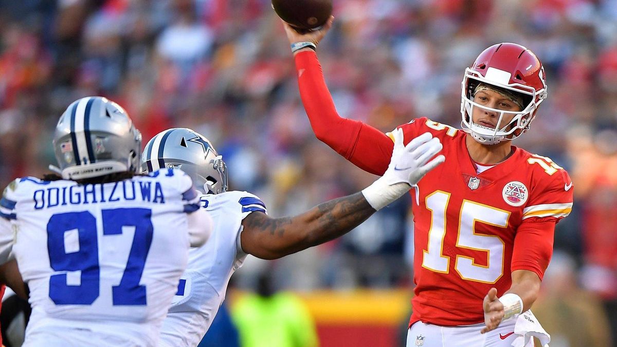 November 25, 2025: Kansas City Chiefs quarterback Patrick Mahomes (15) throws under pressure from the Dallas Cowboys defense in the first half on Nov. 21, 2021, at Arrowhead Stadium in Kansas City,...