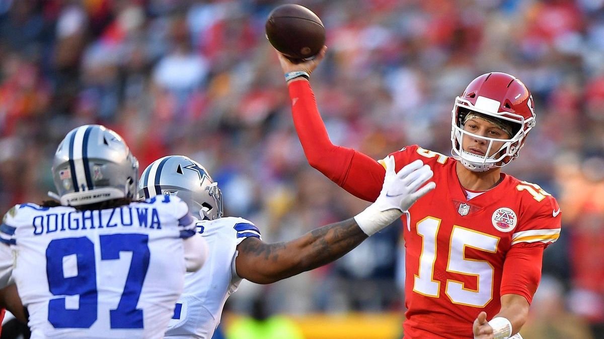 November 25, 2025: Kansas City Chiefs quarterback Patrick Mahomes (15) throws under pressure from the Dallas Cowboys defense in the first half on Nov. 21, 2021, at Arrowhead Stadium in Kansas City,...