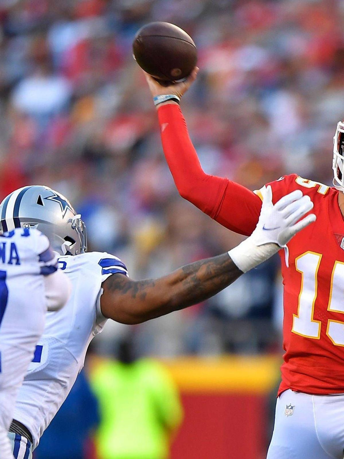 November 25, 2025: Kansas City Chiefs quarterback Patrick Mahomes (15) throws under pressure from the Dallas Cowboys defense in the first half on Nov. 21, 2021, at Arrowhead Stadium in Kansas City,...
