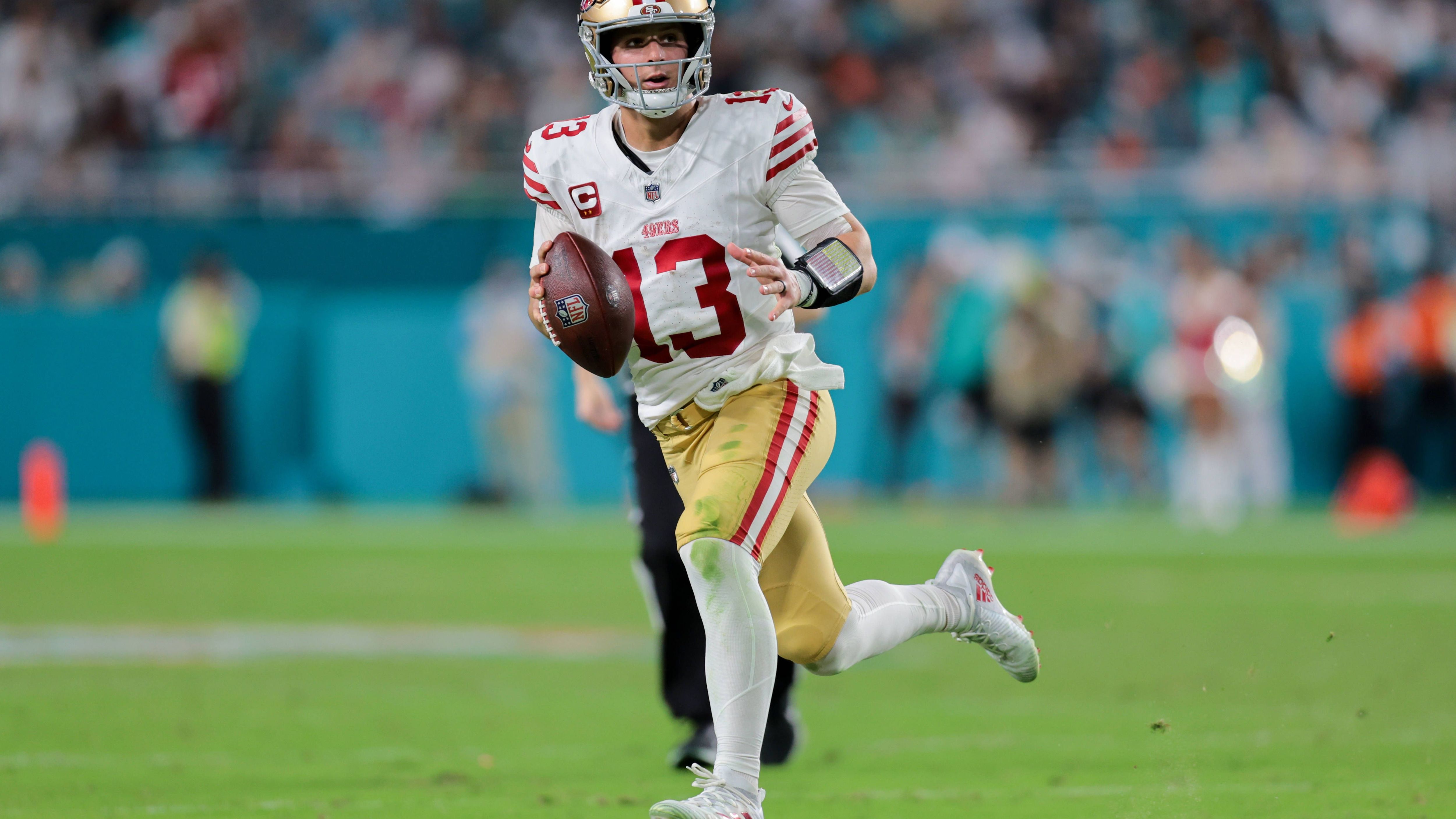 <strong>San Francisco 49ers (NFC West)</strong><br>Die 49ers befinden sich in einem Umbruch, viele Stars, gerade in der Defense, haben die Franchise verlassen. Nichtsdestotrotz hat man mit Fred Warner und Nick Bosa noch zwei Superstars in der Defensive in den eigenen Reihen. Die Offense um Brock Purdy, Christian McCaffrey, Trent Williams und George Kittle kann ebenfalls schlagfertig sein. Mit den Cardinals, Seahawks und Rams gibt es keine richtige Spitzenmannschaft in der Divison. Schwächelt die Konkurrenz, ist für San Francisco der Sprung an die Spitze der NFC West möglich.