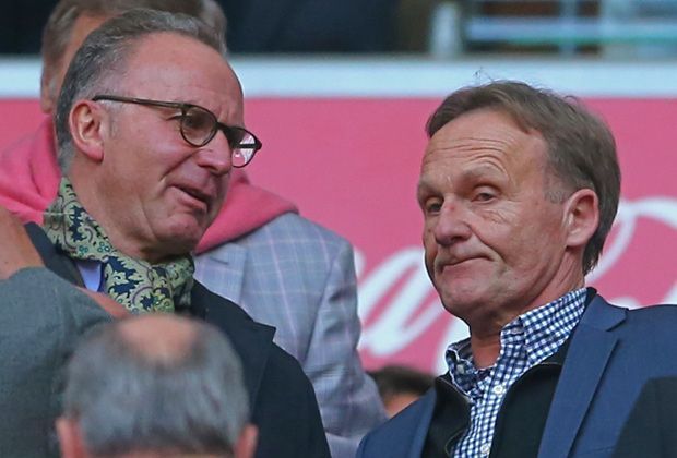 
                <strong>Rummenigge im Dialog mit Watzke</strong><br>
                Nach dem geplatztem Mittagessen: Auf der Tribüne sorgen die Giftpfeile aus dem Vorfeld für gehörigen Gesprächsstoff.
              