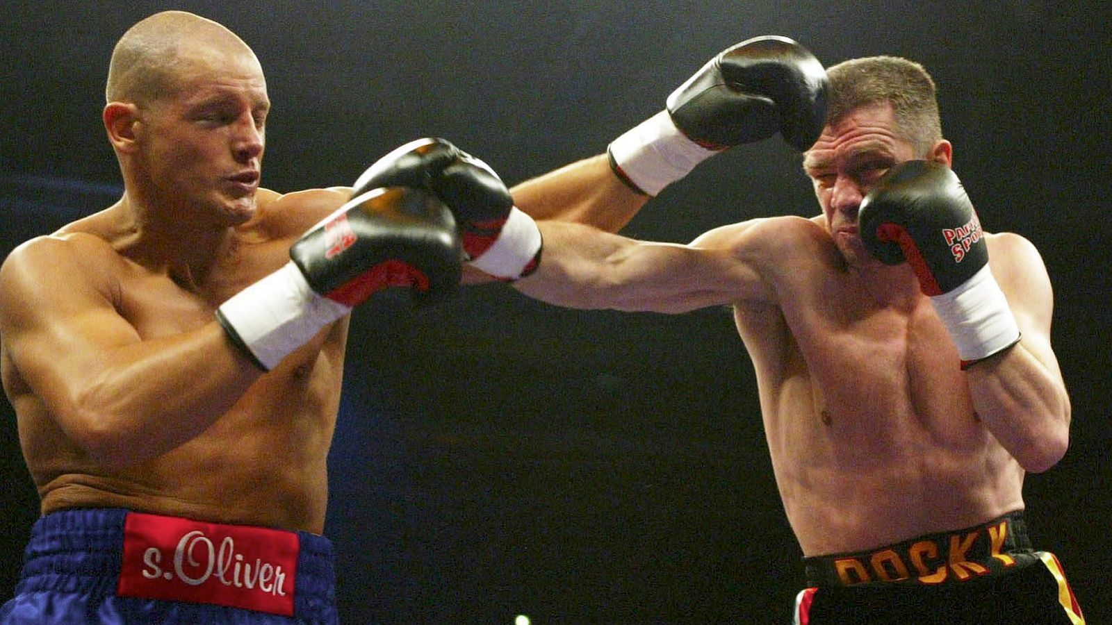 
                <strong>Rocchigiani vs. Thomas Ulrich, 10. Mai 2003, Stuttgart</strong><br>
                Im letzten Kampf seiner Laufbahn unterliegt Rocchigiani dem aufstrebenden Ulrich einstimmig nach Punkten. 2008 soll er ein drittes Mal auf Michalczewski treffen, doch wegen Vertragsproblemen kommt der Kampf doch nicht mehr zustande. Rocchigiani beendet seine Karriere mit einer Bilanz von 41-6-1 bei 19 Knockouts.
              