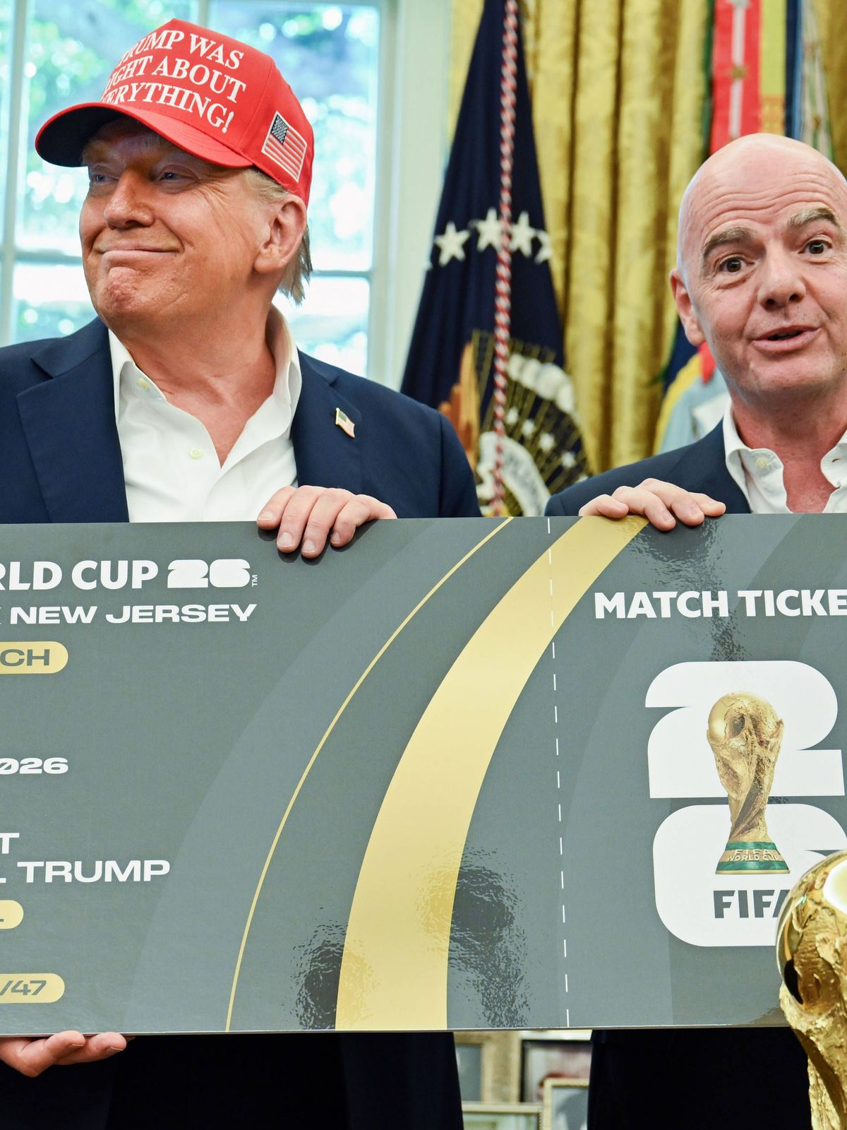 President Donald Trump and FIFA President Gianni Infantino hold a ticket to the 2026 FIFA World Cup after after announcing the 2026 World Cup draw will be held at the Kennedy Center in December in ...