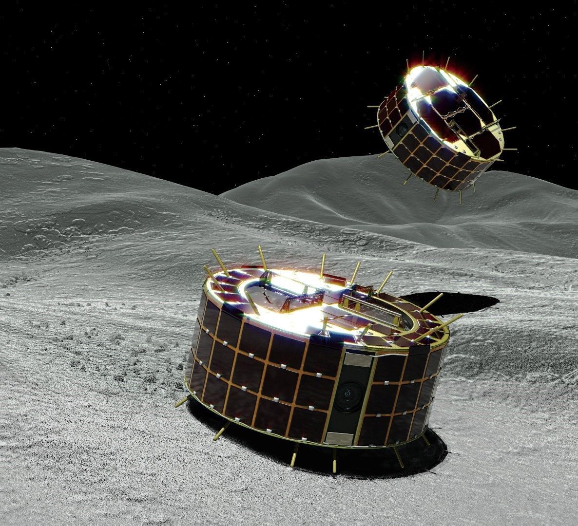 Hayabusa 2 schickte zudem 2 Erkundungs-Rover auf den Asteroiden. Die die Milchtüten-großen Fahrzeuge hatten keine Räder, weil die Ingenieure Angst hatten, sie könnten wegen der geringen Schwerkraft beim Fahren abheben und ins All geschleudert werden. Stattdessen bewegten sie sich mit kleinen Hopsern vorwärts.