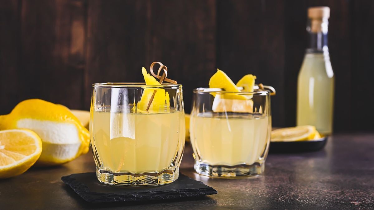 Traditional homemade limoncello in glasses on the table