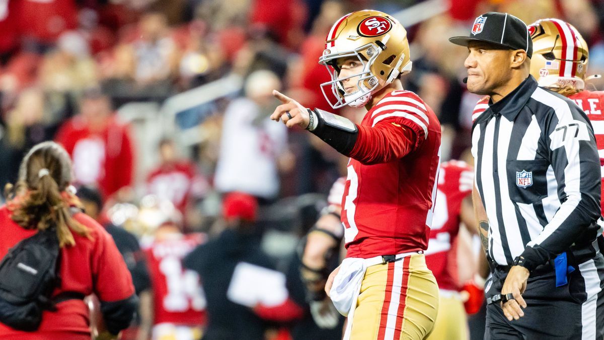 SANTA CLARA, CA - DECEMBER 30: San Francisco 49ers quarterback Brock Purdy (13) points after a throwing a touchdown in the first quarter during a NFL, American Football Herren, USA game against the...