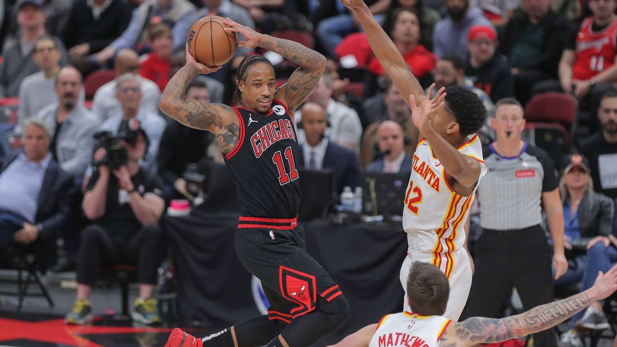 CHICAGO, IL - APRIL 17: DeMar DeRozan 11 of the Chicago Bulls in action during the second half of the 2024 Play-In Tournament against the Atlanta Hawks at the United Center on April 17, 2024 in Chi...