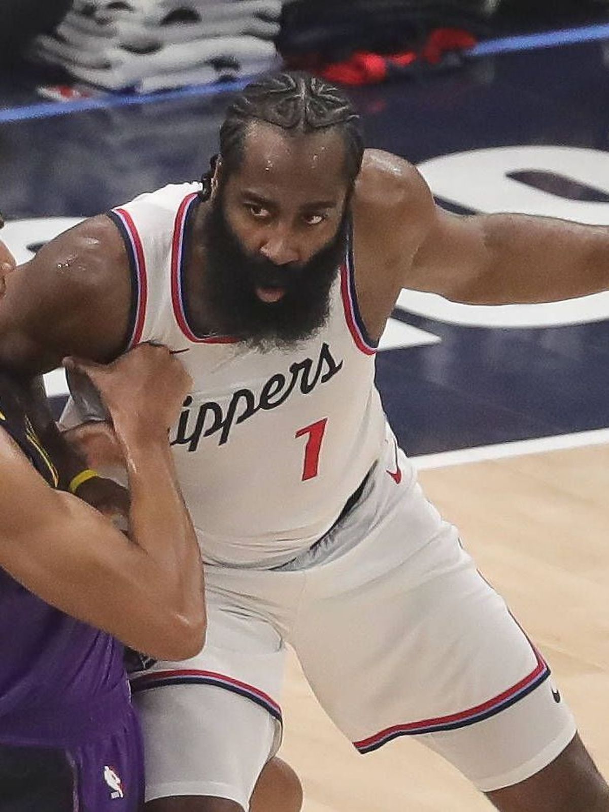 INGLEWOOD, CA - JANUARY 19 : LA Clippers guard James Harden (1) backs down Los Angeles Lakers guard Max Christie (12) during the Los Angeles Lakers vs Los Angeles Clippers on January 19, 2025, at I...