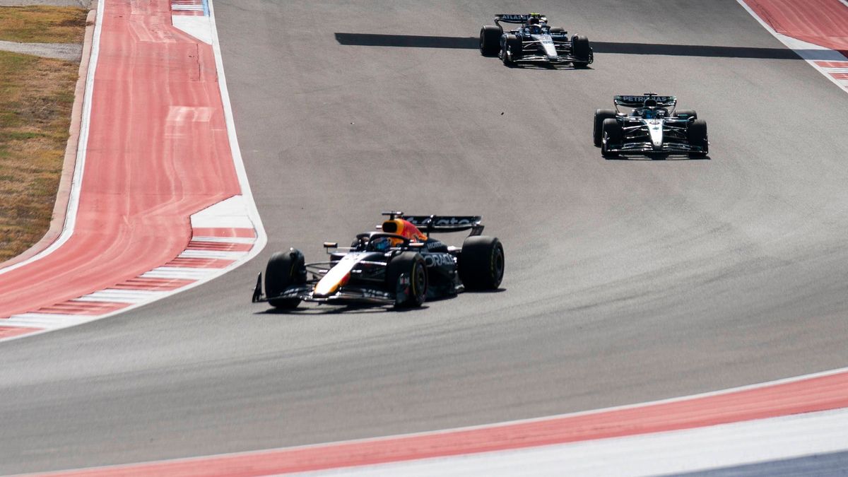 Dutch Formula One driver Max Verstappen of Red Bull Racing leads British Formula One driver George Russell of Mercedes-AMG Petronas and Spanish Formula One driver Carlos Sainz Jr. of Williams Racin...