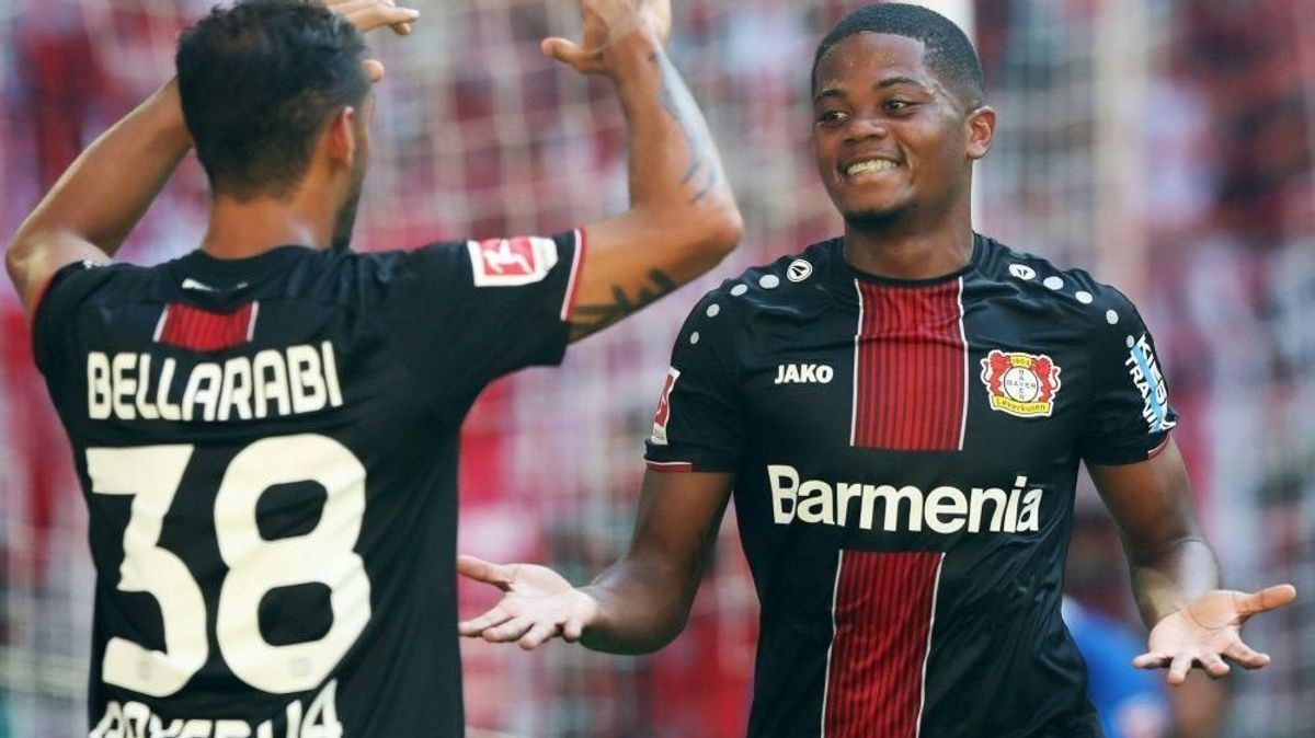 Bellarabi (l.) und Bailey feiern Leverkusens Sieg