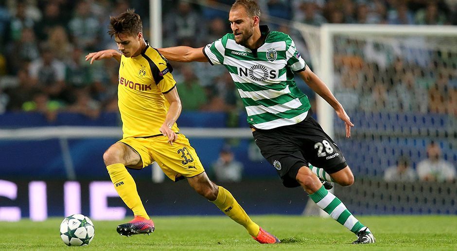 
                <strong>Julian Weigl</strong><br>
                Julian Weigl: Er nutzt kurz vor der Pause den Platz, den ihm Sporting lässt mit einem tollen Abschluss zum 2:0. Sein erstes Pflichtspieltor überhaupt für den BVB. Auch sonst der gewohnt sichere Ballverteiler und Aufräumer vor der Abwehr. ran.de-Note: 1,5
              