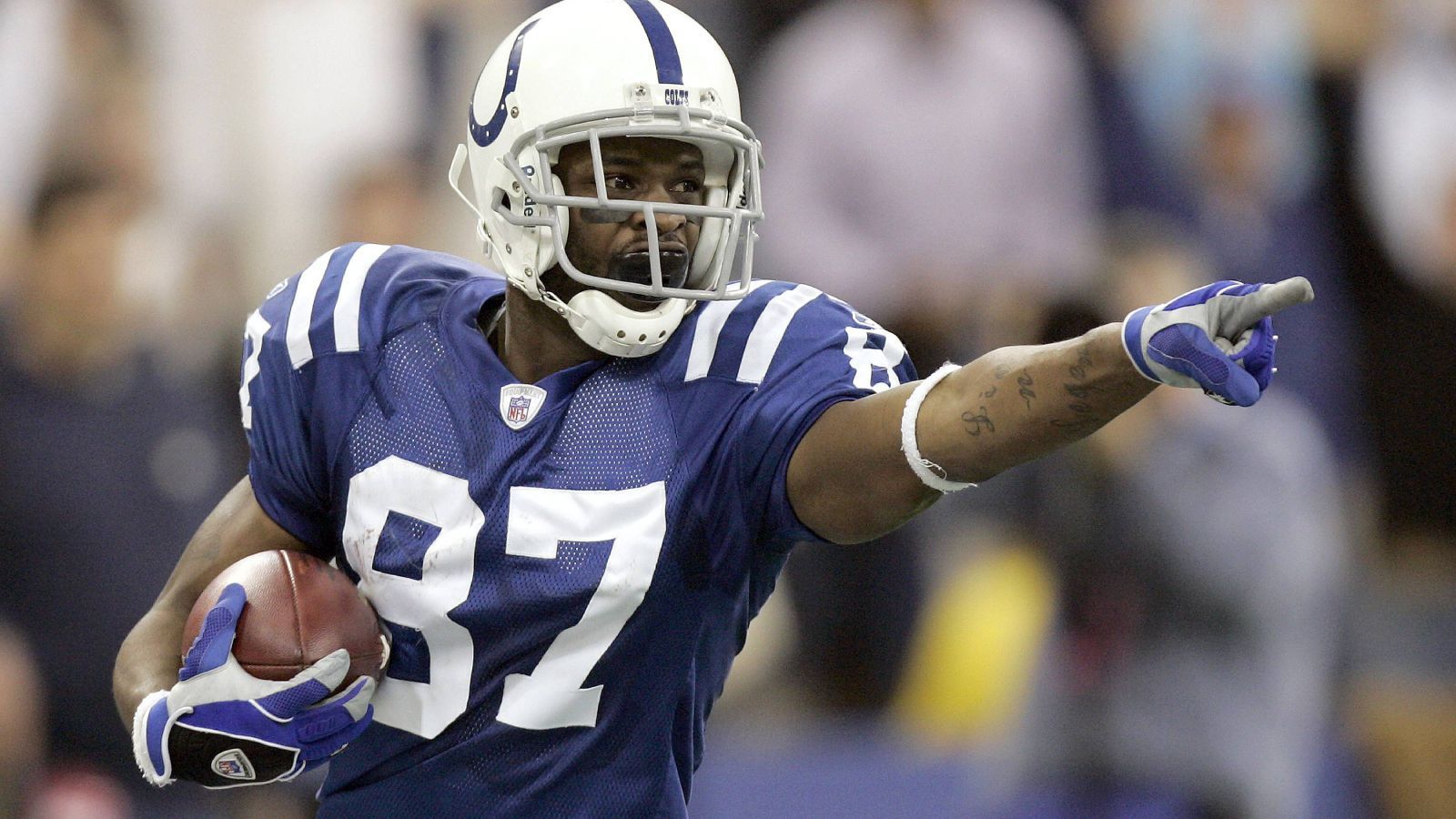 
                <strong>Reggie Wayne</strong><br>
                &#x2022; Position: Wide Receiver<br>&#x2022; In der NFL: 2001 - 2014<br>&#x2022; Meiste Spiele für: Indianapolis Colts<br>
              